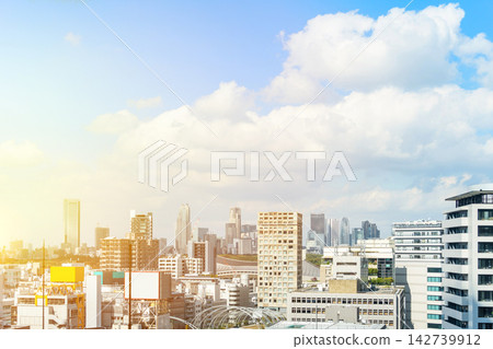 Cityscape and skyline of shibuya, shinjuku in tokyo japan, under sun and bright sky with white cloud and copy space Cityscape and skyline of shibuya, shinjuku in tokyo japan, under sun and bright sky with white cloud and copy space 142739912