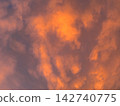 Clouds floating in the sunset sky 142740775