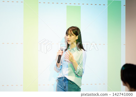 A woman presenting A woman presenting 142741000