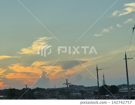 A landscape of the sky and clouds dyed in the colors of the sunset. A landscape of the sky and clouds dyed in the colors of the sunset. 142742757