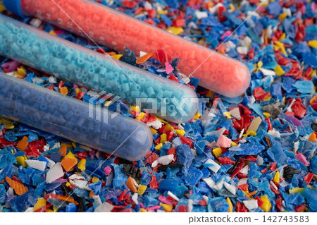Plastic colorful pieces recycling shredded for industrial use. Plastic colorful pieces recycling shredded for industrial use. 142743583