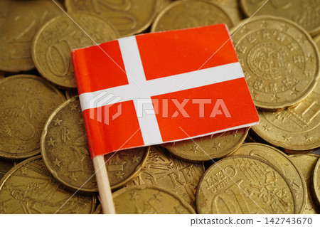 Denmark flag on coins background, finance and accounting, banking concept. 142743670