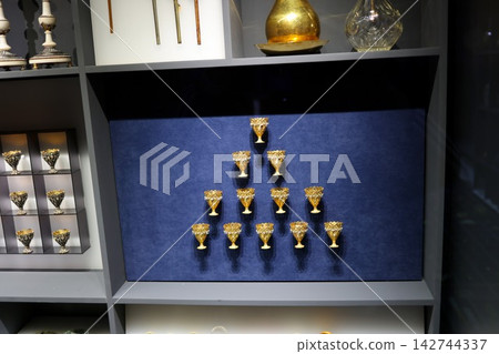 Golden decorated goblets lined up in the shop in Istanbul Golden decorated goblets lined up in the shop in Istanbul 142744337