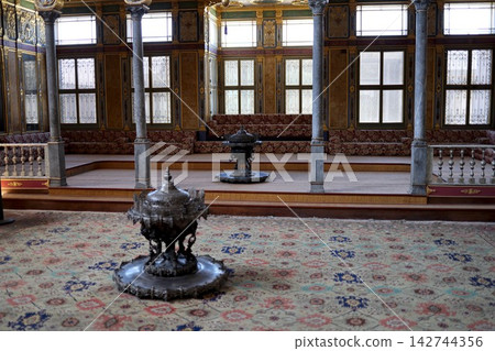 Interior of the Baghdad Pavilion in Topkapi Palace, Istanbul, and a metal brazier. Interior of the Baghdad Pavilion in Topkapi Palace, Istanbul, and a metal brazier. 142744356