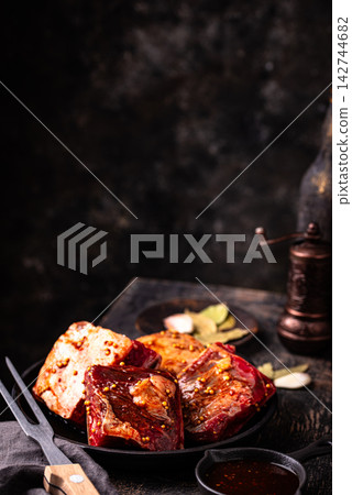 Raw uncooked lamb ribs for barbecue Raw uncooked lamb ribs for barbecue 142744682