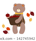 A bear harvesting apples with a basket in its arms. 142745942