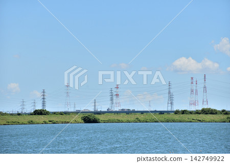 Electricity is transmitted to the city via power lines. Electricity is transmitted to the city via power lines. 142749922