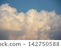 A summer afternoon, approaching cumulonimbus clouds 142750588