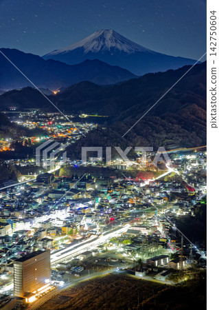 Night view of Otsuki city and Mount Fuji as seen from Iwadono Mountain Night view of Otsuki city and Mount Fuji as seen from Iwadono Mountain 142750604