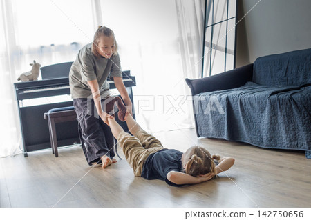 Little children having fun at home sibling portrait Little children having fun at home sibling portrait 142750656