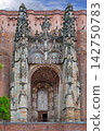 Front view of the gothic porch portal of Albi Cathedral in France. Overcast weather, cloudy sky, daytime lighting 142750783