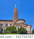 Low angle view of Basilica of Saint-Sernin in Toulouse, France. Romanesque apse and bell tower in square crop layout 142750787