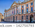 Front facade view of the Capitole in Toulouse, France. Neoclassical architecture under bright sunny blue sky 142750793