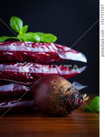 Vacuum packed grated beet prepared for freezer storage at home Vacuum packed grated beet prepared for freezer storage at home 142751507