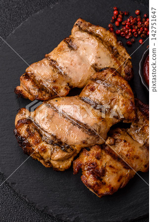 Grilled chicken breast seasoned with salt and spices. Grilled chicken 142751647
