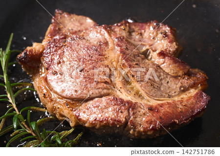 Bake steak in a frying pan Bake steak in a frying pan 142751786