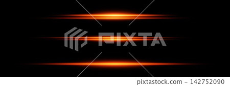 Three horizontal orange light effects on a black background providing a bright overlay Three horizontal orange light effects on a black background providing a bright overlay 142752090