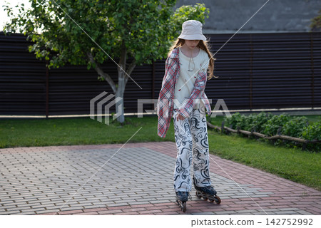 Teenage Girl Spending Time Alone Outdoors, Growing Up, Independence, Personal Space And Youth Lifestyle Concept. Copy Space Teenage Girl Spending Time Alone Outdoors, Growing Up, Independence, Personal Space And Youth Lifestyle Concept. Copy Space 142752992