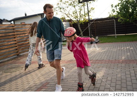 Father And Children Spending Quality Time Together Outdoors, Family Bonding, Active Parenting And Happy Family Lifestyle Concept Father And Children Spending Quality Time Together Outdoors, Family Bonding, Active Parenting And Happy Family Lifestyle Concept 142752993