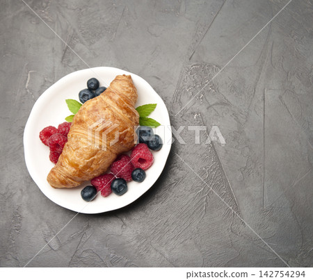 Croissant with berries with berries Croissant with berries with berries 142754294