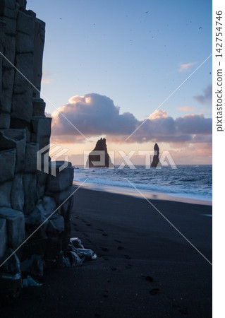 Sunrise view of Reynisfjara beach with its iconic sea stacks, located on the south coast of Iceland. Sunrise view of Reynisfjara beach with its iconic sea stacks, located on the south coast of Iceland. 142754746