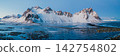 Snow-covered Vestrahorn mountain and icy landscape at Stokksnes beach, South East Iceland 142754802
