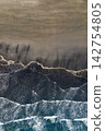 Aerial view of waves and patterns on the black sand beach at Stokksnes, South East Iceland 142754805