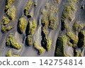 Aerial view of grass-covered dunes on Stokksnes beach, South East Iceland. 142754814