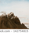 Dramatic peaks of Vestrahorn mountains dusted with snow in Stokksnes, South East Iceland 142754815