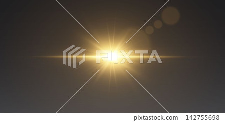 Golden light source creating a strong lens flare and bokeh effects on a dark background Golden light source creating a strong lens flare and bokeh effects on a dark background 142755698