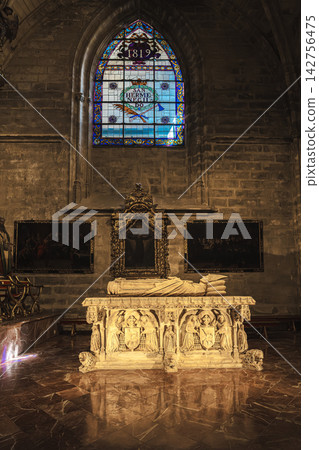 Recumbent marble tomb effigy on an ornate sarcophagus in Seville Cathedral Recumbent marble tomb effigy on an ornate sarcophagus in Seville Cathedral 142756475