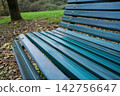 Park bench empty outdoor seat autumn 142756647