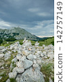 Stone Cairns on Rocky Mountain Plateau in Lovcen National Park Montenegro 142757149