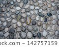 Natural Rounded Pebble Stone Texture Background Close Up 142757159