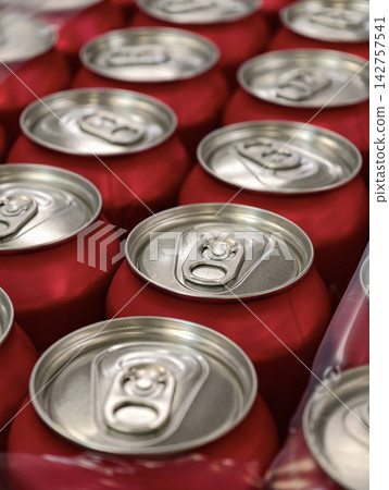 Red aluminum soda cans grouped in factory packaging showcasing organized beverage manufacturing logistics product preparation and supply chain operations Red aluminum soda cans grouped in factory packaging showcasing organized beverage manufacturing logistics product preparation and supply chain operations 142757541