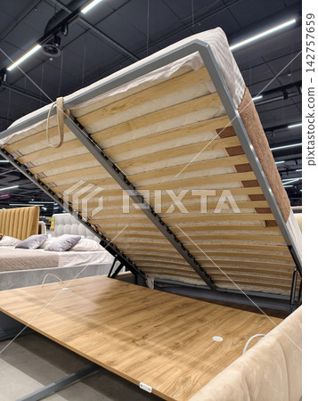 Bed with vertical lift mechanism Bed with vertical lift mechanism 142757659