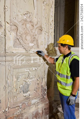 Historic interior wall carefully smoothed by conservation specialist Historic interior wall carefully smoothed by conservation specialist 142758054