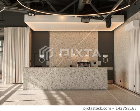 Modern cafe lobby interior with terrazzo counter warm lighting espresso station and curtain-divided seating under soft daylight Modern cafe lobby interior with terrazzo counter warm lighting espresso station and curtain-divided seating under soft daylight 142758165