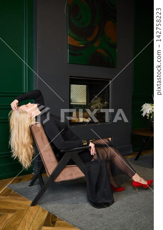 Sophisticated Caucasian woman in floral decor and chic attire Sophisticated Caucasian woman in floral decor and chic attire 142758223