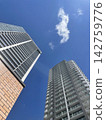 Two high-rise apartment buildings 142759776