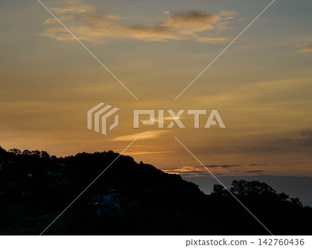 A sunrise view from a hill in Okamoto, Higashinada Ward, Kobe City, overlooking the cityscapes of Kobe and Ashiya, as well as Osaka Bay. A sunrise view from a hill in Okamoto, Higashinada Ward, Kobe City, overlooking the cityscapes of Kobe and Ashiya, as well as Osaka Bay. 142760436