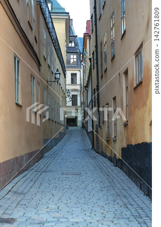 A street in Gamla Stan, Stockholm, in the early morning. A street in Gamla Stan, Stockholm, in the early morning. 142761809