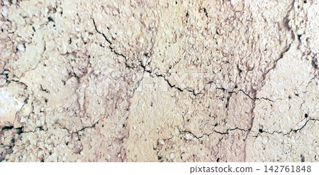 Cracked Granular Earth and Stone Texture Cracked Granular Earth and Stone Texture 142761848