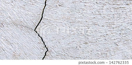 Cracked white concrete wall texture Cracked white concrete wall texture 142762335