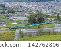 A freight train running near Shioyama in the Kofu Basin. 142762806