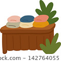 Folded Towels on Shelf 142764055