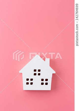 White wooden house, pink background White wooden house, pink background 142764699