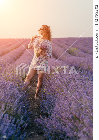 Lavender woman field, young woman with curly hair stands in blooming purple lavender field at sunset enjoying warm summer sunshine outdoors Lavender woman field, young woman with curly hair stands in blooming purple lavender field at sunset enjoying warm summer sunshine outdoors 142765202