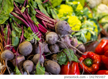 Beet for sale on market counter. Vegetarian food concept Beet for sale on market counter. Vegetarian food concept 142765487
