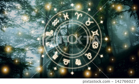 Zodiac signs displayed in a forest with light effects at dusk Zodiac signs displayed in a forest with light effects at dusk 142766027